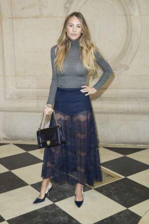 Dylan Penn dares to wear a subtly sheer lace skirt during the Dior autumn-winter fashion show on 27th February 2018 in Paris.