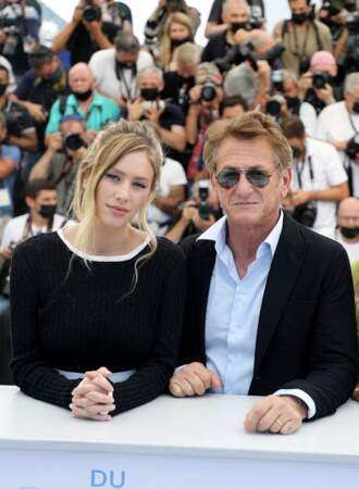 Dylan Penn proudly poses next to her father, American actor Sean Penn, during the photocall of the film “Flag Day” in Cannes, 11th July 2021.