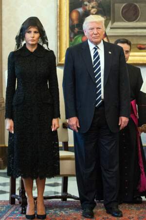 2017: A black dress with a bardot collar