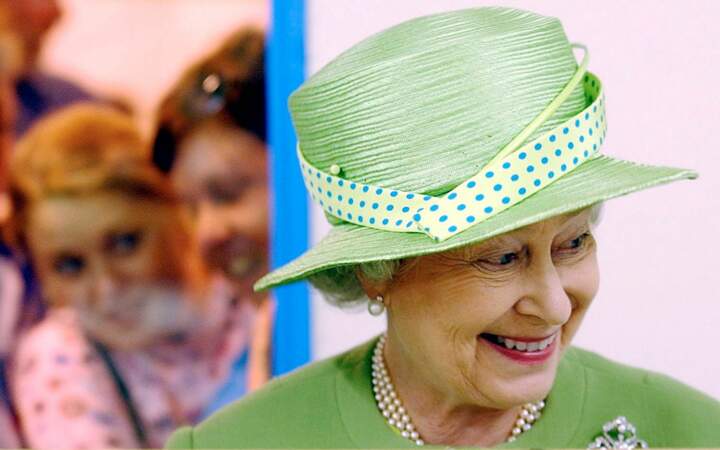 July 2004: A green sun hat with a blue polka dot ribbon  