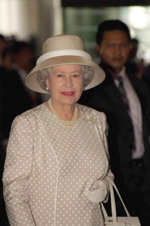 September 1998: A ribbon-decorated grey and cream hat 