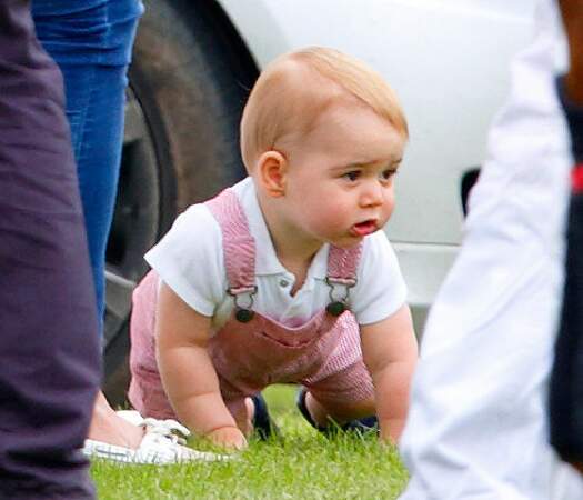 June 15, 2014: Prince George and his mother Princess of Wales watch Prince William and Prince Harry play in the Jerudong Trophy charity polo match